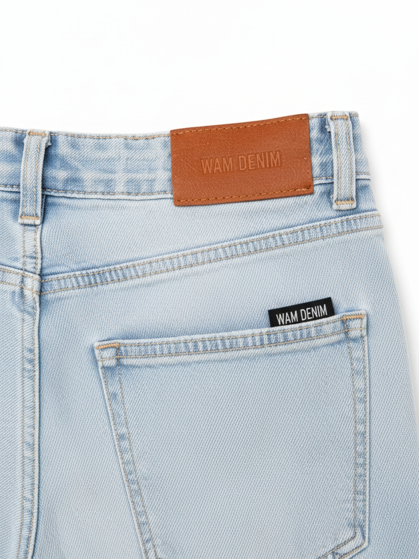 Leather patch close-up - Yevan Light Blue Denim Shorts
