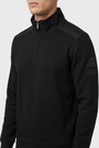 Nerik Black sweater quarter-zip and sleeve patch detail on model
