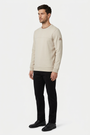 Onvik Beige sweater on model, side view