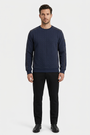 Thuron Navy sweater on model, front view