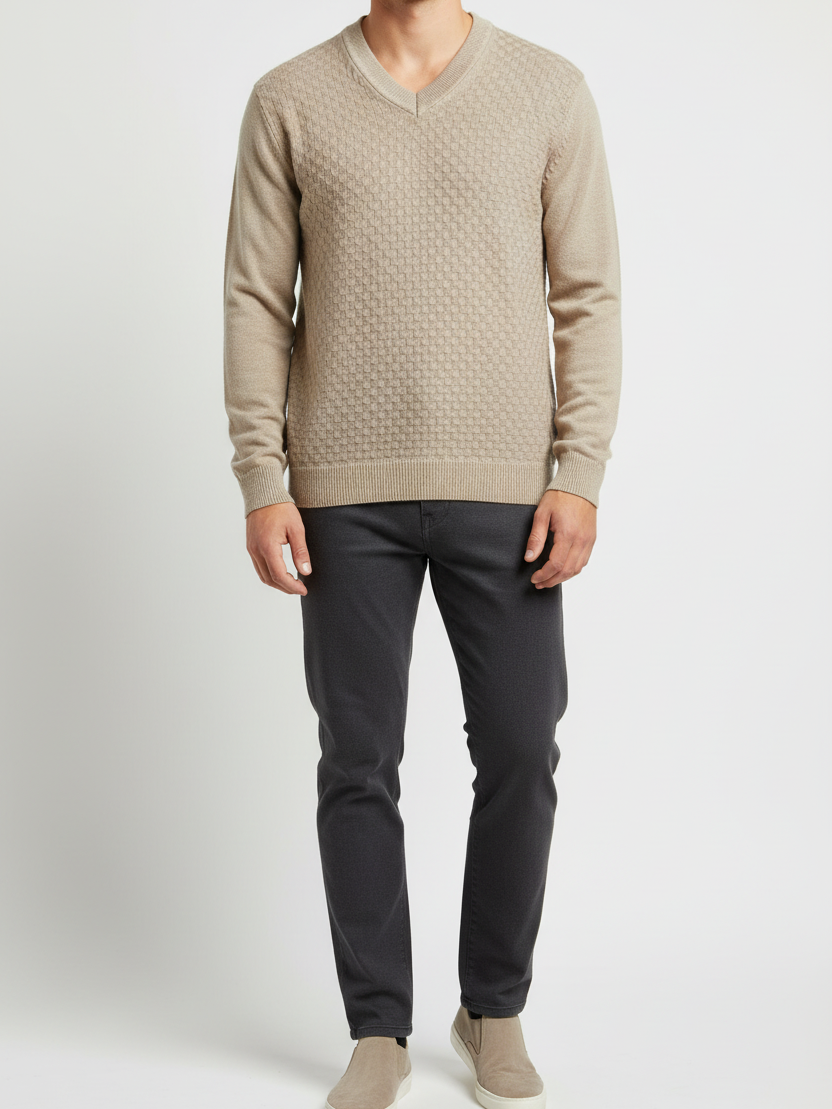 Close view of the ribbed V-neck and basket-weave front texture of the Forge beige sweater