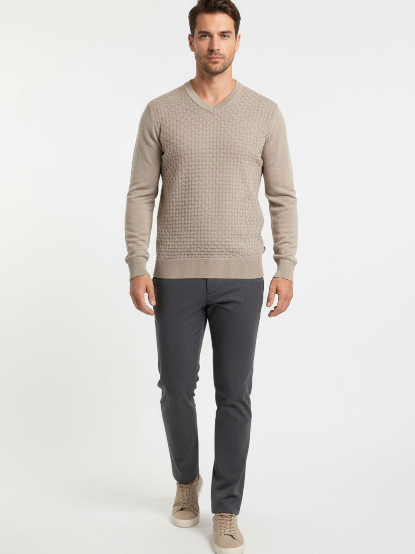 Male model in a walking pose wearing the Wam Denim Forge beige textured V-neck sweater