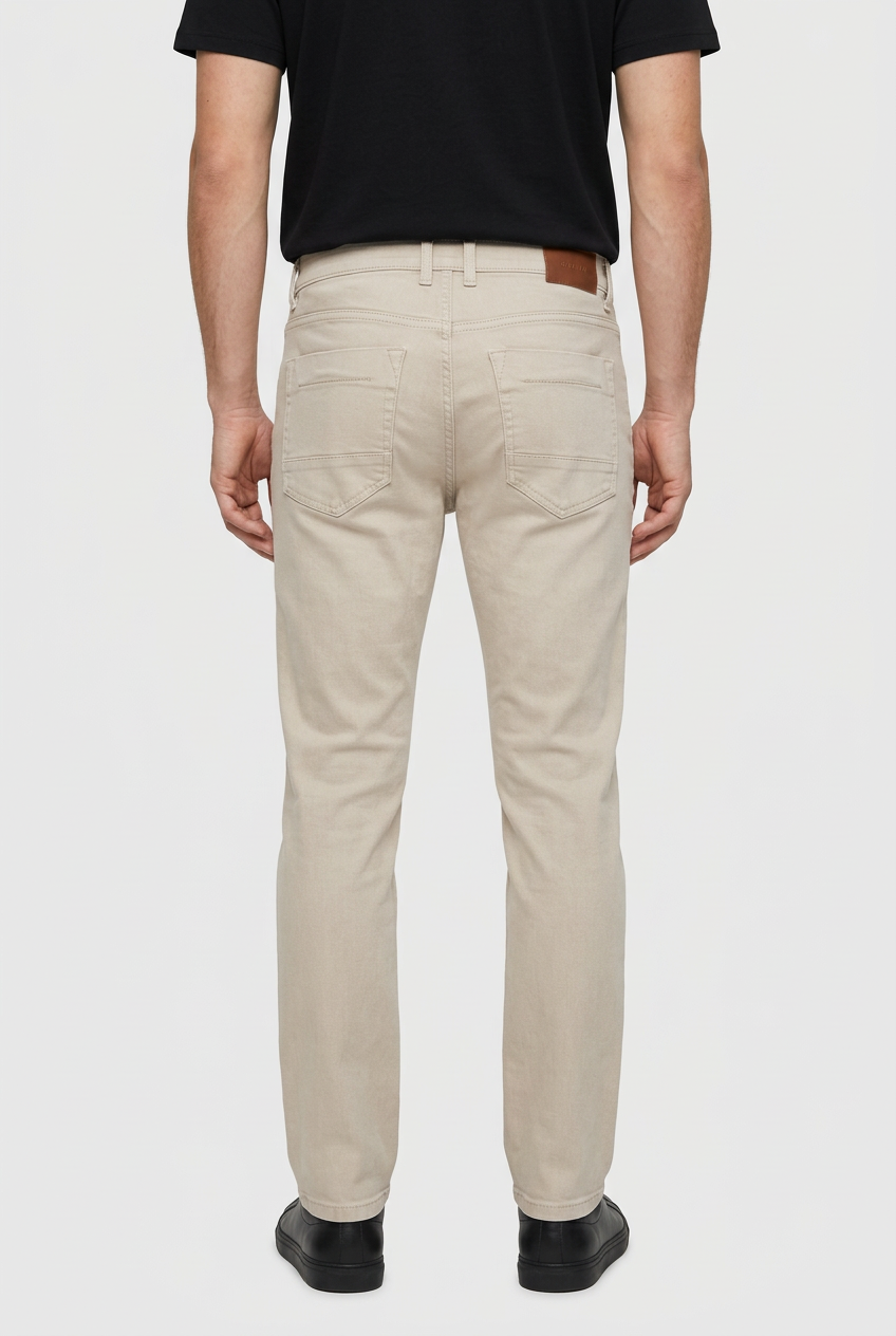 Grelix Light Beige jeans on model, back view