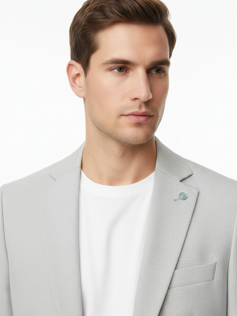 Lapel and chest detail - light grey micro-check blazer on model