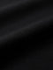 Close-up of black suit blazer fabric showing smooth, refined texture.