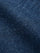 Close-up of blue denim fabric showing textured weave and durable finish